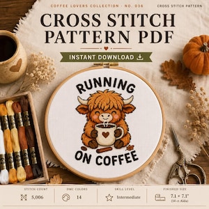 May include: A cross stitch pattern PDF featuring a highland cow holding a coffee mug with the text RUNNING ON COFFEE. The design is displayed in a wooden embroidery hoop, accompanied by embroidery floss, a pumpkin, and scissors.
