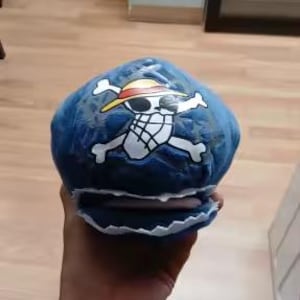 May include: A set of three ceramic mugs with a speckled, matte finish. The mugs are in shades of cream, light gray, and dark gray. Each mug has a simple, minimalist design, perfect for coffee or tea.