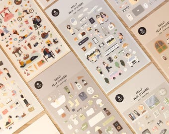 May include: A collection of multiple rectangular sticker sheets featuring various daily life themes. Each sheet contains small, colorful illustrations of people, household objects, travel items, and office supplies, with text labels like Daily Deco Stickers.