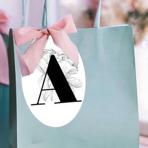 Oval labels, 7.5 cm x 12 cm, with a floral background, peony line art and black lettering. Full alphabet set (A–Z). Instant download