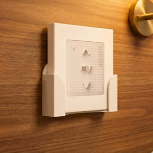 May include: A set of three ceramic mugs with a speckled, matte finish in cream, light grey, and dark grey. Each mug has a simple, minimalist design, suitable for coffee or tea.