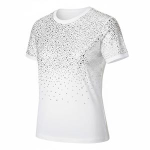 May include: White t-shirt with a crew neck and short sleeves. The top is embellished with silver-colored rhinestones that fade from dense at the top to sparse at the bottom. The shirt is made of a soft, comfortable material.