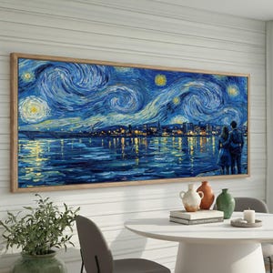 May include: A framed print of a starry night scene over a city and water, with a couple in the foreground. The artwork uses swirling brushstrokes in blue, yellow, and white, and is set in a wooden frame.