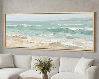 May include: A horizontal rectangular oil painting featuring a coastal seascape with textured impasto brushstrokes. The artwork displays shades of seafoam green, turquoise, and white waves crashing onto a sandy beige shoreline under a pale sky.