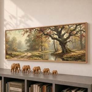 May include: A panoramic landscape painting in a wooden frame depicting a large oak tree by a winding river in autumn, with five small brown elephant figurines of varying sizes arranged in a row on a shelf below the artwork.