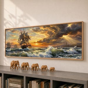 May include: A rectangular wall art print featuring a tall ship sailing on turbulent ocean waves during a golden sunset, with a lighthouse on the distant shore. Below the print, five small, light brown elephant figurines stand in a row.