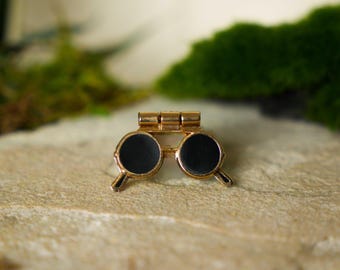 Pin para gafas abatibles