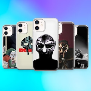 May include: A collection of five phone cases featuring various designs. The cases showcase images of a masked figure in different styles, including black and white, and colorful illustrations. The cases are displayed against a gradient blue background.