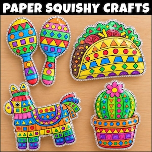 Peut inclure: Quatre créations en papier squishy colorées avec le texte PAPER SQUISHY CRAFTS en haut. Les objets incluent deux maracas, un taco, une piñata âne et un cactus en pot, tous décorés de motifs géométriques vibrants en rouge, bleu, vert et jaune.