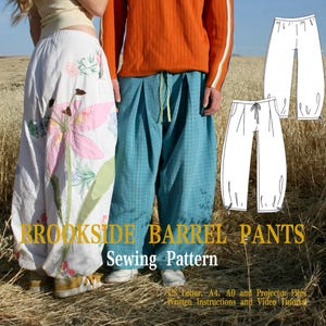 May include: Image of two people wearing barrel pants. One person wears a white skirt with a large pink floral design. The other person wears blue plaid pants. The image also shows a sewing pattern with the text "BROOKSIDE BARREL PANTS Sewing Pattern".