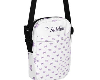 The Sideline Crossbody Bag with purple bows