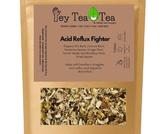 May include: A brown paper bag of "Yey Tea Tea" brand herbal tea, labeled "Acid Reflux Fighter." The label lists ingredients like slippery elm bark and rosemary leaves. The bag contains a mix of dried herbs.