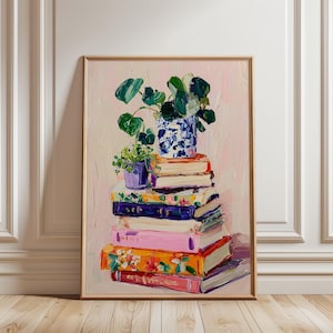 May include: An oil painting in a wooden frame depicting a stack of colorful books topped with two potted plants. The books feature various hues including orange, pink, blue, and white with floral patterns. The plants have green leaves in blue and purple pots.