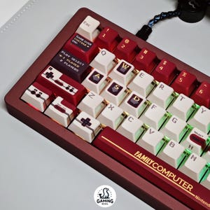 May include: A white ceramic mug with a black handle and the text "But First, Coffee" in a handwritten style. The mug is on a white surface. Suitable for hot drinks.