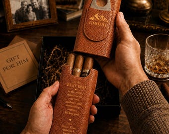 May include: A brown textured leather cigar case with a metal cutter integrated into the top flap. The case is engraved with the name Timothy and a mountain graphic. The lower section features the text To the BEST DAD in the world, thank you for your love, guidance, and unwavering support. We love you! Love, Claire, Elias, Annalise & Gannon.