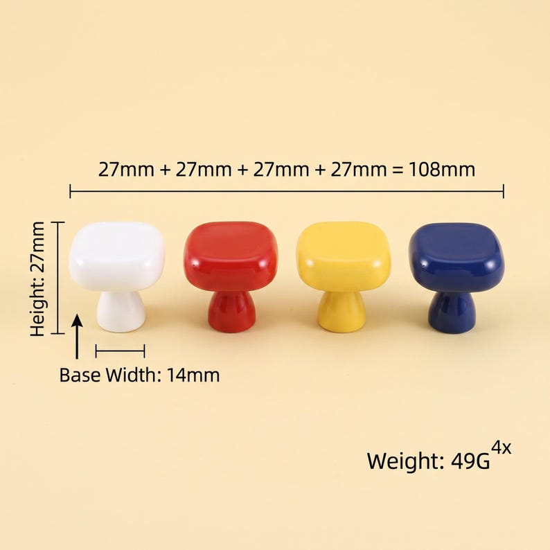 May include: Four square cabinet knobs in white, red, yellow, and blue. Each knob has a height of 27mm and a base width of 14mm. The total width of the four knobs is 108mm. The set of four knobs has a combined weight of 49g. The knobs are glossy.
