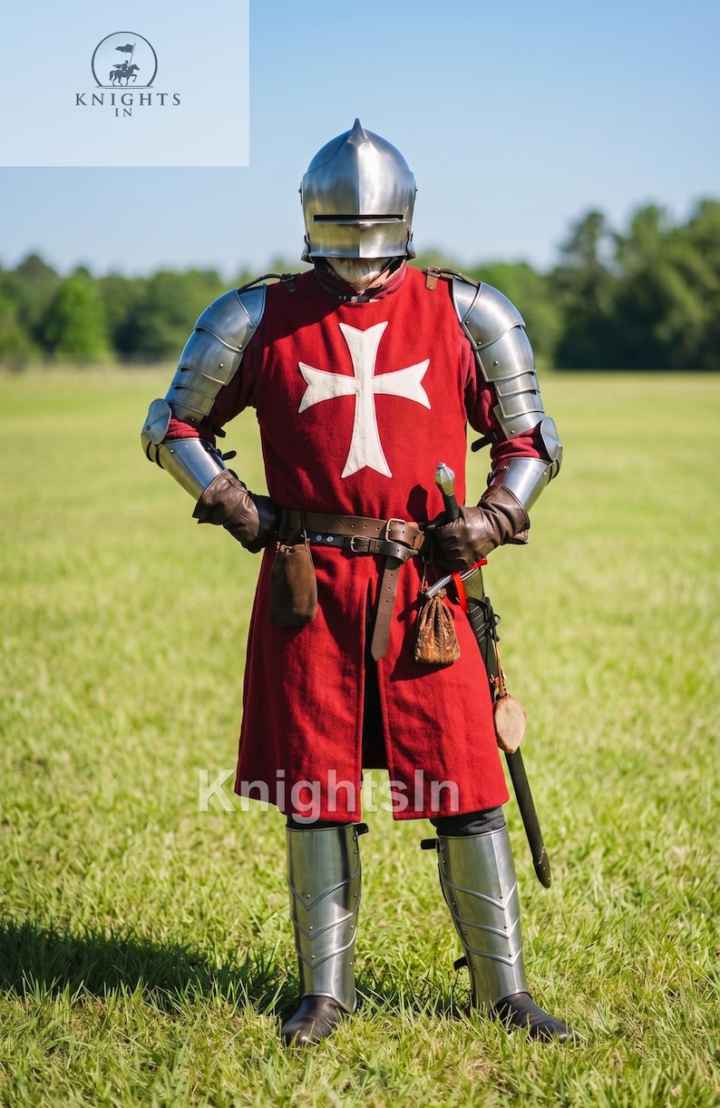 May include: A full suit of medieval armor, including a helmet, shoulder guards, and leg armor. The red tunic features a white cross. A sword hangs at the side. The image includes the text "Knights In".