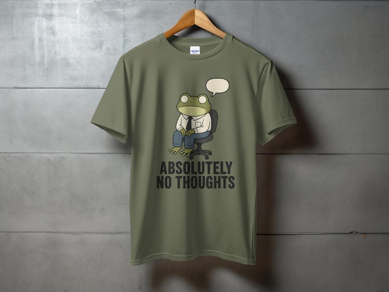 Green t-shirt with a frog wearing a shirt and tie, sitting, with "ABSOLUTELY NO THOUGHTS" text.