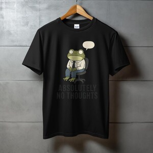 Black t-shirt with graphic of frog sitting in office chair, "Absolutely No Thoughts".