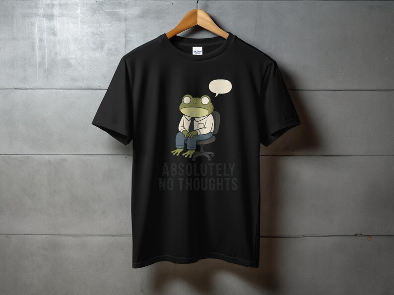 Black t-shirt with graphic of frog sitting in office chair, "Absolutely No Thoughts".