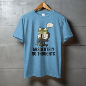 Blue t-shirt with cartoon frog saying "ABSOLUTELY NO THOUGHTS".