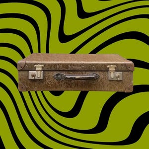 May include: A vintage brown suitcase with metal hardware, including corner protectors, latches, and a handle. The suitcase has a textured surface and is set against a green and black wavy background. A classic travel accessory.