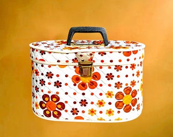 Vintage floral orange-brown quilted plastic vanity case, retro 70s style beauty kit