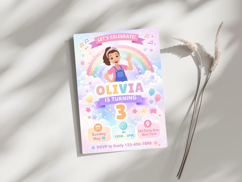 May include: A colorful birthday party invitation with the text "LET'S CELEBRATE!" and "OLIVIA IS TURNING 3". The design includes a cartoon girl, rainbow, clouds, stars, and balloons. The invitation also includes the date, time, and location.
