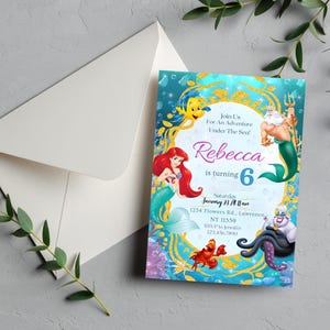 May include: A colorful invitation with a mermaid theme. The invitation features Ariel, Sebastian, King Triton, and Ursula. The text reads "Join Us For An Adventure Under The Sea! Rebecca is turning 6". An envelope is next to the invitation.