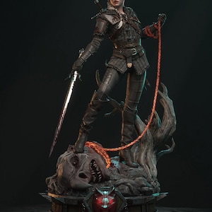 May include: A detailed statue of a woman in dark armor, holding a sword and a chain. She stands atop a monster, with a Witcher emblem at the base. The figure has blonde hair and is set against a dark background.