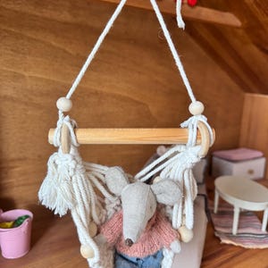 Dockhushängande gunga / hängsits / hängmatta