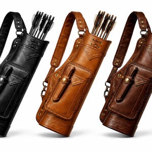 May include: Three leather quivers in black, tan, and brown, each filled with arrows. The quivers have shoulder straps, pockets, and decorative stitching. The arrows have white fletching.