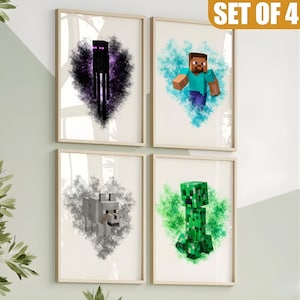 May include: A set of four framed art prints, each depicting a Minecraft character. The prints feature an Enderman, Steve, a wolf, and a Creeper, set against a watercolour-style background. The frames are a light wood colour.