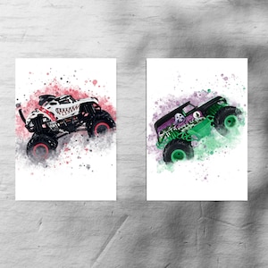 May include: Two prints showcasing monster trucks in a watercolour style. One truck is white with black detailing and a snarling mouth. The other is black and green with a skull design, set against a colourful splatter background.