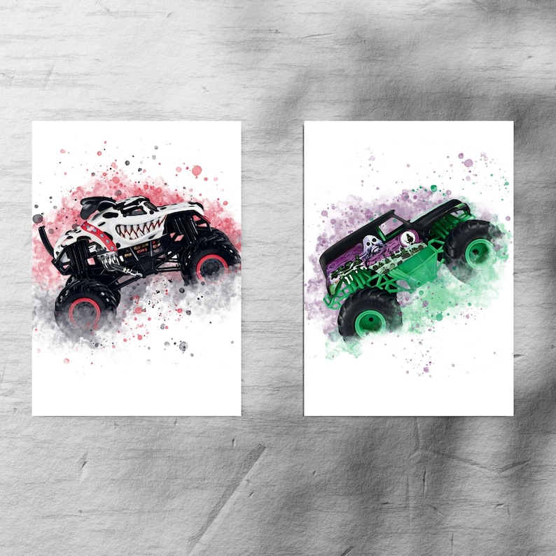 May include: Two prints showcasing monster trucks in a watercolour style. One truck is white with black detailing and a snarling mouth. The other is black and green with a skull design, set against a colourful splatter background.