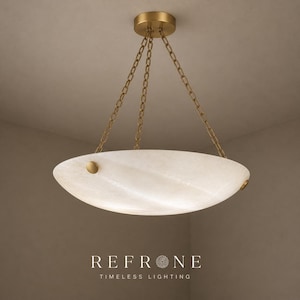 Profile of hanging alabaster pendant light, gently curved bowl shape, warm brass ceiling cap and chain links