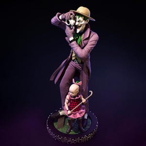 May include: A detailed statue of the Joker character from DC Comics, in a purple suit and hat, holding a skull. A small child in a pink dress and boots stands at his feet. The statue is on a circular base with a chain-like border.