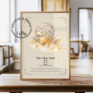 May include: Framed art print featuring a detailed illustration of a classical figure with wings, set against a beige background. The text "The Libra Soul" and "The Living Harmony" are displayed below the illustration, along with additional text.