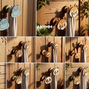 Puede incluir: Una colección de diez ganchos de pared de madera con caras de animales, incluyendo un hipopótamo, ciervo, zorro, oso, león, conejo, mapache, jirafa, panda y tigre. Cada gancho está diseñado para colgar objetos e incluye texto de formatos.