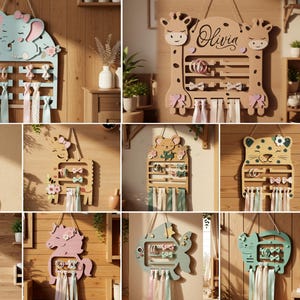 May include: A collection of ten wooden wall-mounted hair accessory organizers featuring various animal shapes including an elephant, giraffe, mouse, leopard, unicorn, and fish. Each organizer includes horizontal bars for clips and ribbons.