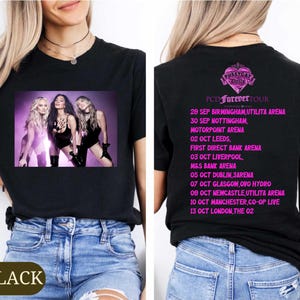 May include: A black t-shirt featuring a front graphic of three performers in black bodysuits against a purple background. The back displays pink text listing the Pussycat Dolls PCD Forever Tour dates and venues from September to October.