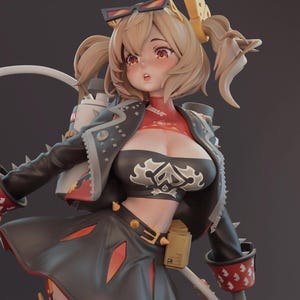 May include: A detailed figurine of a female character with blonde hair, wearing a black jacket with silver studs, a black crop top with a white design, and a black skirt with orange accents. The figure has red eyes and is posed against a gray background.
