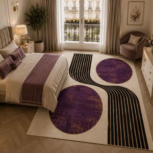Luxury geometric rug with purple and gold artwork for modern minimalist contemporary interiors.