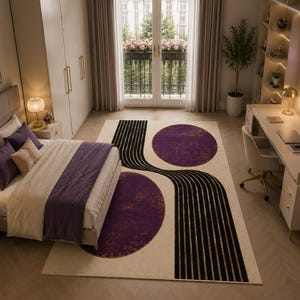 Contemporary minimalist area rug with flowing black stripes and elegant purple gold artistic detailing.