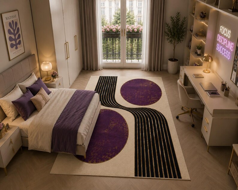 Contemporary minimalist area rug with flowing black stripes and elegant purple gold artistic detailing.