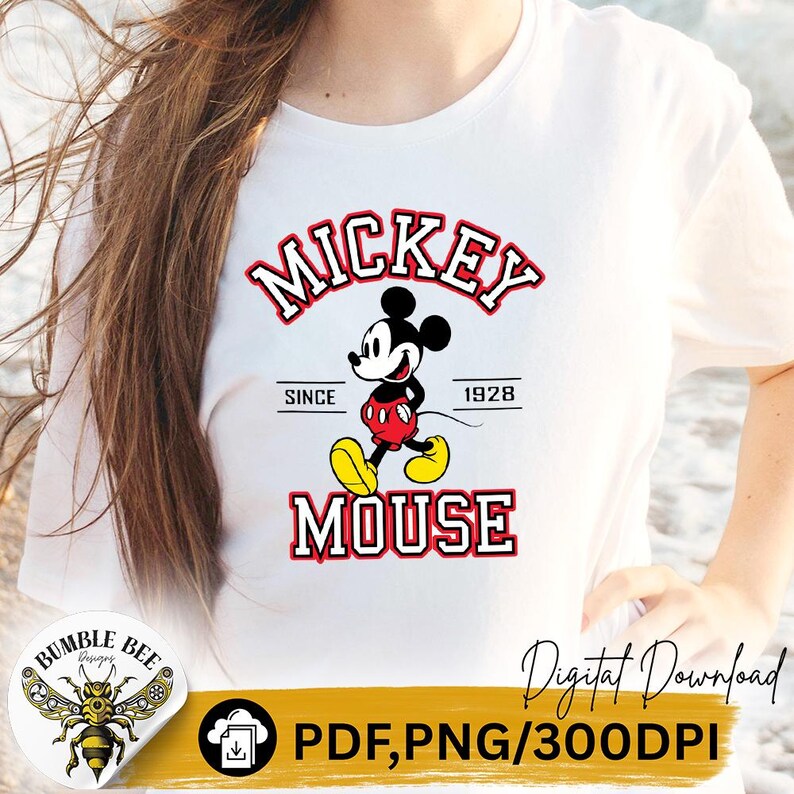 May include: White t-shirt featuring a graphic of Mickey Mouse in a walking pose, with the words "MICKEY MOUSE" in red and black lettering. The text "SINCE 1928" is also included. The shirt is a digital download.