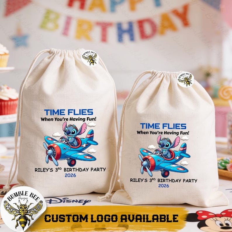 May include: Two beige drawstring bags with a blue and red airplane graphic featuring a cartoon character. Text on the bags reads "TIME FLIES When You're Having Fun!" and "RILEY'S 3RD BIRTHDAY PARTY 2026". A Bumble Bee logo and Disney logo are also visible.
