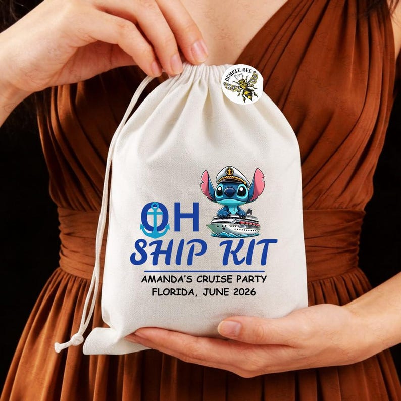 May include: A white drawstring bag with the text "OH SHIP KIT" and a cartoon character on a cruise ship. The bag also includes the text "AMANDA'S CRUISE PARTY FLORIDA, JUNE 2026". A small round sticker with a bee is attached to the bag.