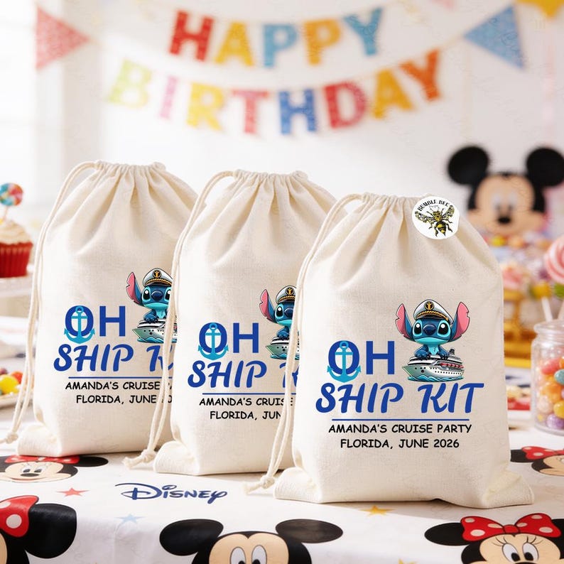 May include: Three beige drawstring bags with blue text and a cartoon character illustration. The bags read "OH SHIP KIT" and "AMANDA'S CRUISE PARTY FLORIDA, JUNE 2026". A "Happy Birthday" banner is in the background.