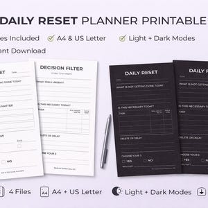 May include: A printable daily reset planner with the text "Daily Reset Planner Printable". The image shows two white and two black planners, a pen, and icons indicating 4 files, A4 & US Letter, light and dark modes, and instant download.